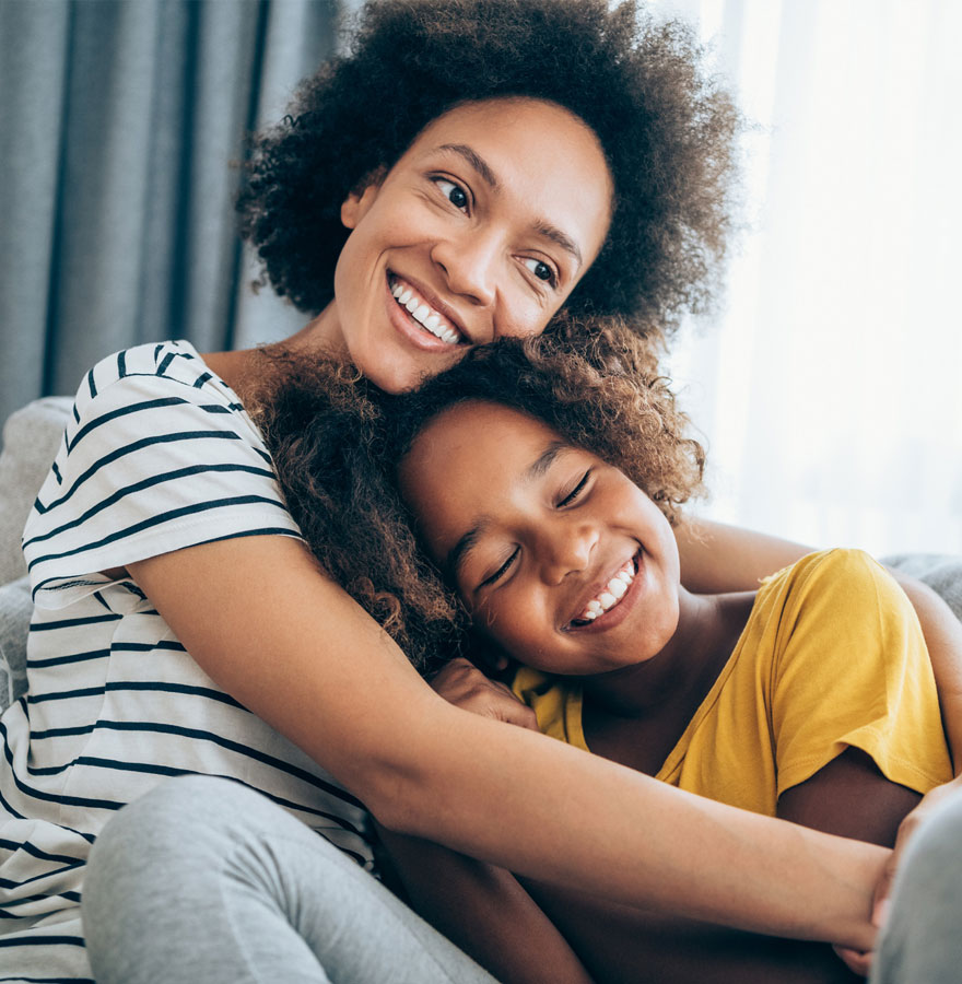 Mother hugging daughter. Mother hugging daughter.